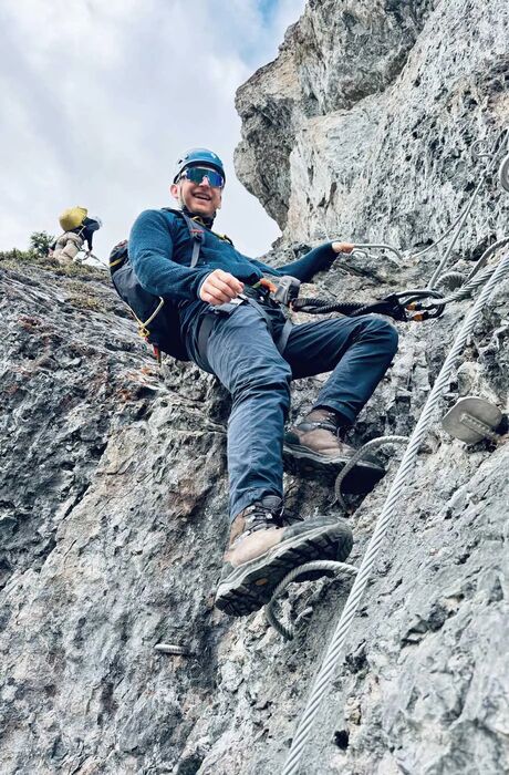 Mark Glinka - CEO and founder climbing a rock face