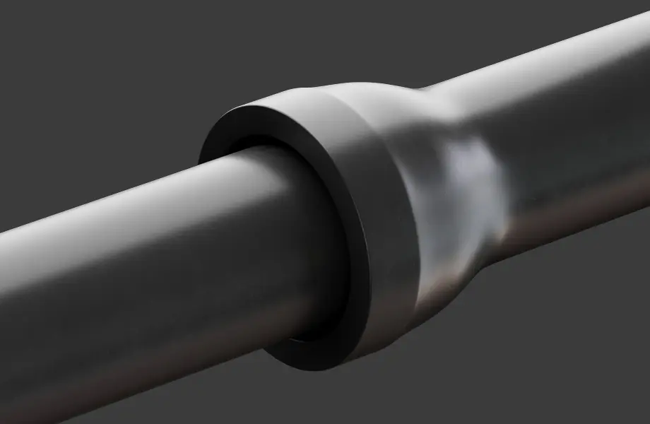 A section of a grey iron pipeline at a socket joint.